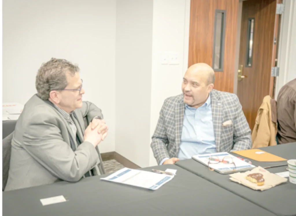 two attendees having conversation